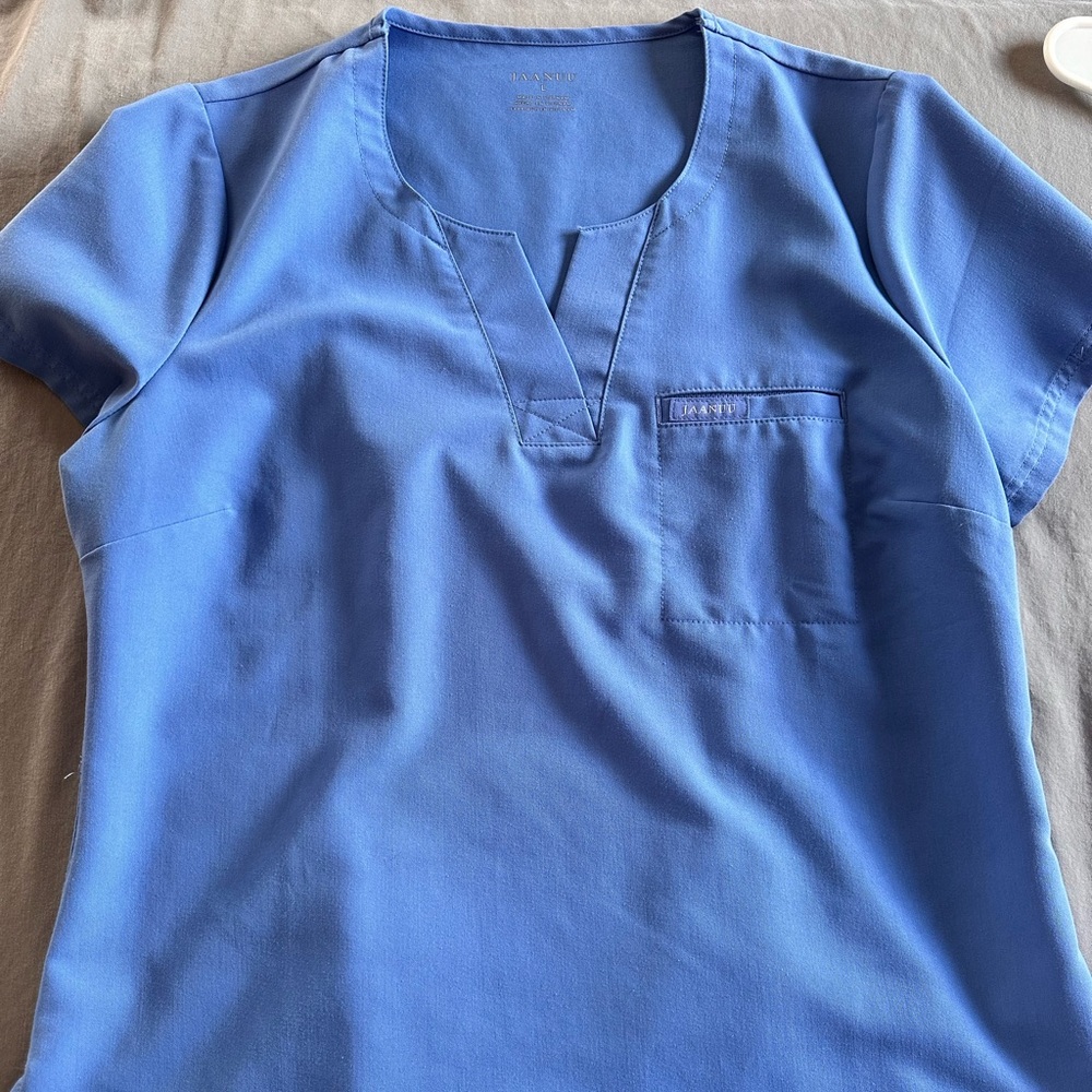 Jaanuu one pocket tuck in ceil blue size large